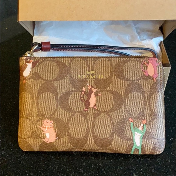 New with tag coach party animal wristlet